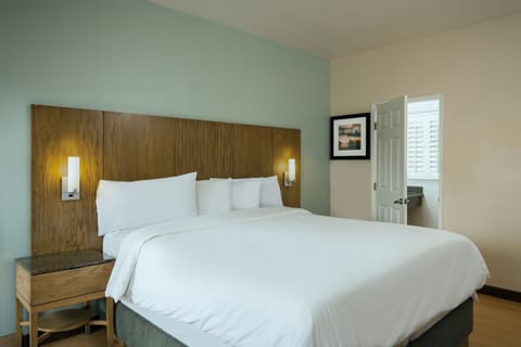 Desk, blackout drapes, iron/ironing board, free cribs/infant beds