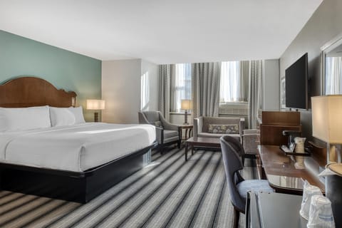 Deluxe Suite, 1 King Bed, Non Smoking, Refrigerator (with Sofabed) | Pillowtop beds, in-room safe, desk, laptop workspace