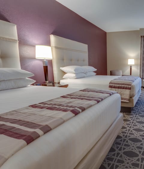 Desk, blackout drapes, iron/ironing board, free cribs/infant beds