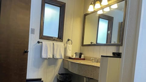 Combined shower/tub, hair dryer, towels, soap