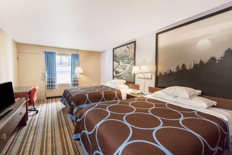 Desk, iron/ironing board, free cribs/infant beds, rollaway beds