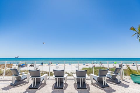 On the beach, white sand, sun loungers, beach umbrellas