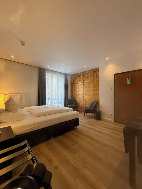 Comfort Triple Room, 2 Bedrooms, Balcony, Mountain View | Free WiFi, bed sheets