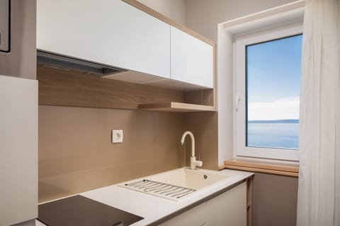 Superior Apartment, 2 Bedrooms, Balcony, Sea View | Private kitchen | Coffee/tea maker, electric kettle