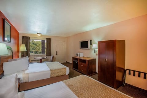 Room, 2 Queen Beds, Smoking | Iron/ironing board, free cribs/infant beds, free WiFi, bed sheets