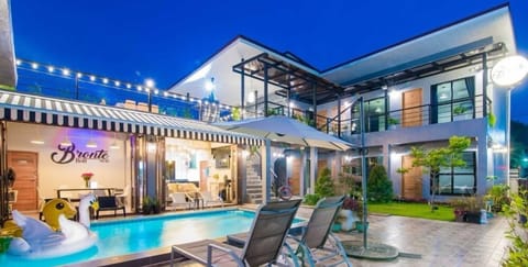 Outdoor pool, open 7 AM to midnight, pool umbrellas, sun loungers