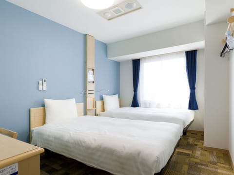 Desk, iron/ironing board (on request), WiFi (free), bed sheets