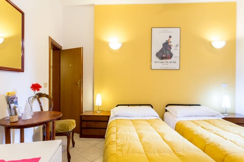 Double or Twin Room | Minibar, iron/ironing board, free WiFi, bed sheets