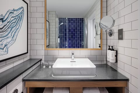 Eco-friendly toiletries, hair dryer, towels