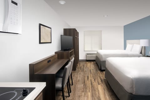 Desk, laptop workspace, free WiFi, bed sheets
