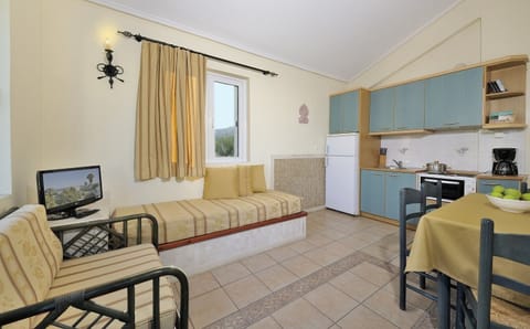 Apartment, 1 Bedroom | Living area | Flat-screen TV