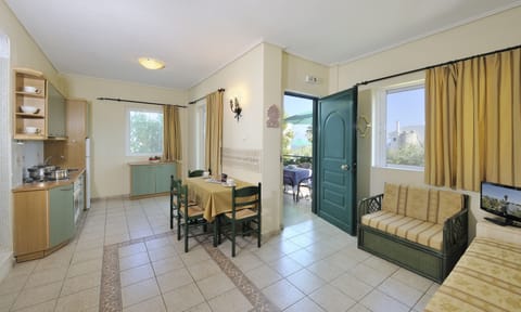 Duplex, Sea View | Living area | Flat-screen TV