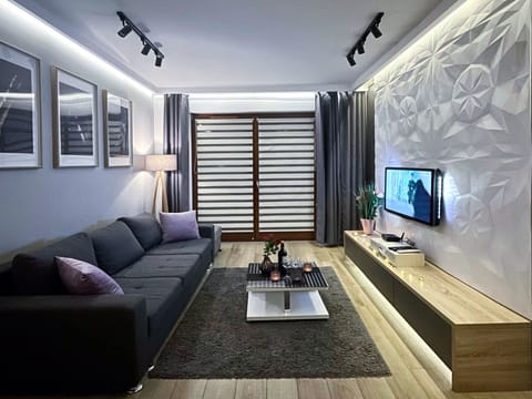 Comfort Apartment, Balcony, Courtyard View | Living room | Flat-screen TV