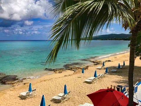 On the beach, sun loungers, beach umbrellas, beach towels