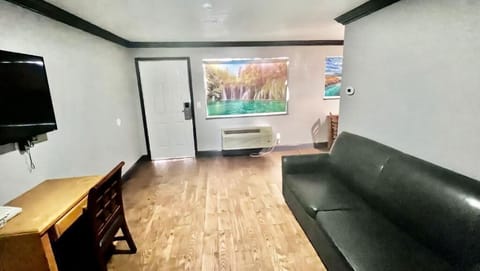 Suite, 1 King Bed, Non Smoking, Refrigerator & Microwave | Desk, blackout drapes, iron/ironing board, free WiFi