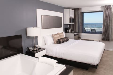 1 King Oceanfront, Jacuzzi Room | Premium bedding, pillowtop beds, desk, laptop workspace