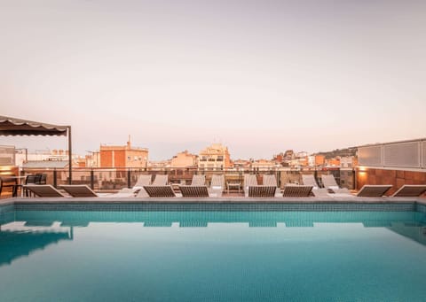 Outdoor pool, open 10:00 AM to 9:00 PM, sun loungers