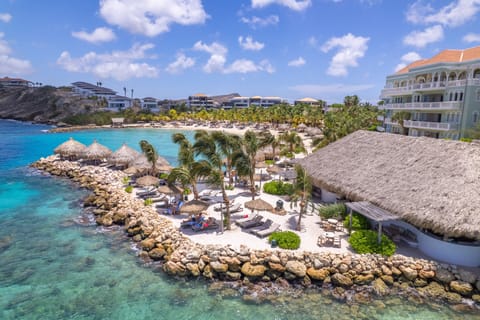 Private beach, white sand, free beach cabanas, sun loungers
