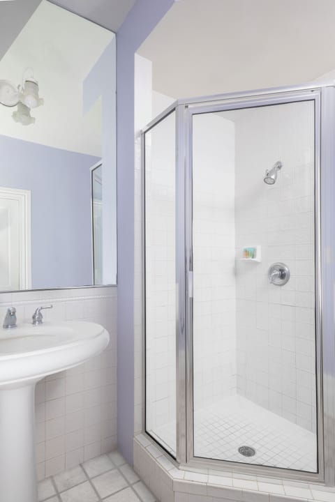 Shower, designer toiletries, hair dryer, bathrobes