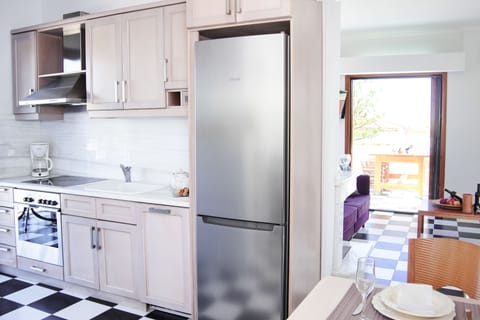 Deluxe Apartment, 1 Bedroom, Sea Facing | Private kitchen | Fridge, oven, stovetop, coffee/tea maker