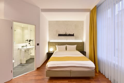 Hypo-allergenic bedding, desk, laptop workspace, iron/ironing board