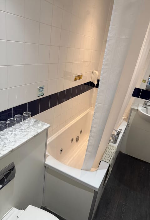 Family 4 Standard Room | Bathroom | Hair dryer, towels