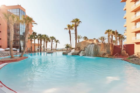 Indoor pool, outdoor pool, pool umbrellas, sun loungers
