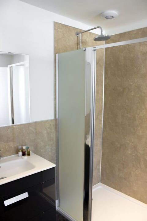 Twin Room | Bathroom | Hair dryer, towels