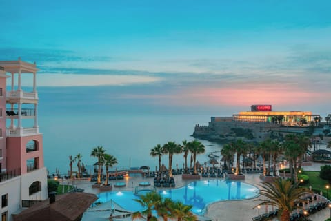Indoor pool, outdoor pool, pool umbrellas, sun loungers