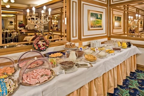 Daily buffet breakfast (EUR 14 per person)