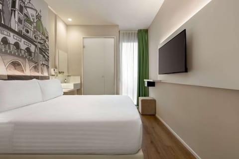 Premium bedding, down comforters, pillowtop beds, minibar