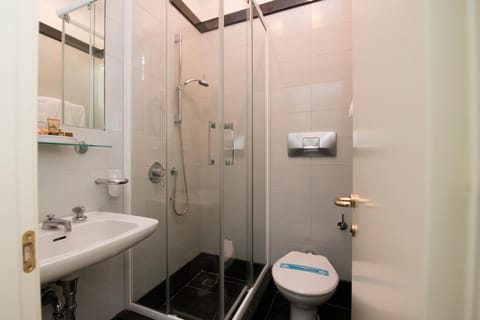 Shower, free toiletries, hair dryer, towels