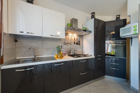 Apartment, 2 Bedrooms | Private kitchen | Full-size fridge, microwave, stovetop, dishwasher