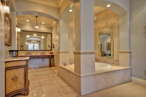 Capri Garden Suite | Bathroom | Separate tub and shower, jetted tub, hydromassage showerhead