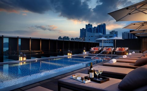 Seasonal outdoor pool, open 8:00 AM to 8:00 PM, sun loungers