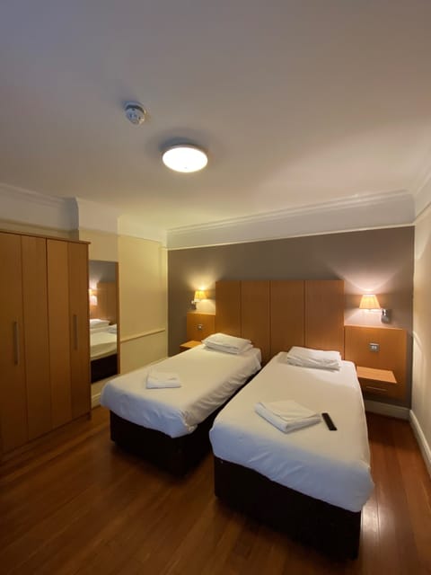 Standard Twin Room | Premium bedding, desk, laptop workspace, iron/ironing board