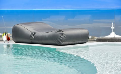 Outdoor pool, open 9:00 AM to 9:00 PM, pool umbrellas, sun loungers