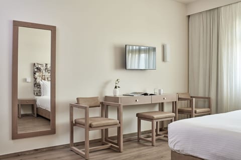 Free minibar, in-room safe, desk, laptop workspace