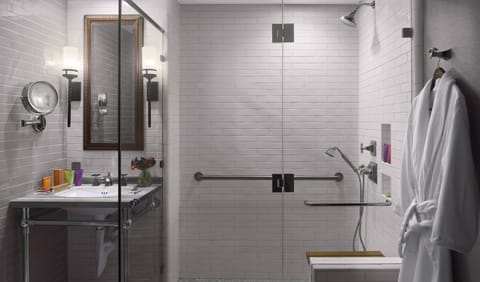 Shower, designer toiletries, hair dryer, bathrobes