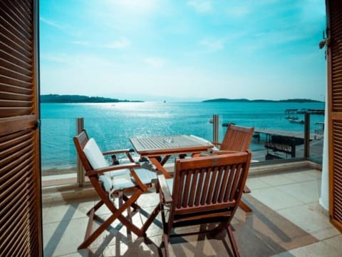 Exclusive Suite, 2 Bedrooms, Sea View, Beachfront | Balcony view