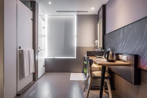 Business Twin Room (With Window) | Bathroom | Shower, hair dryer, slippers, towels
