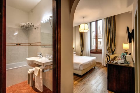 Double or Twin Room | Minibar, in-room safe, desk, iron/ironing board