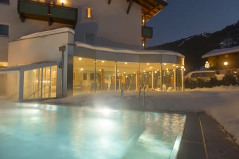 Indoor pool, outdoor pool, pool umbrellas, sun loungers