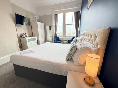 Deluxe Double Room, 1 King Bed, Sea View | Hypo-allergenic bedding, desk, blackout drapes, iron/ironing board