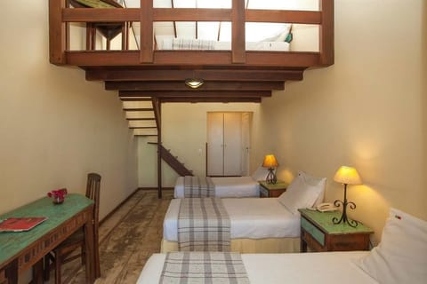 Family Room | Minibar, desk, blackout drapes, iron/ironing board