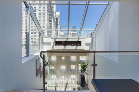 Sky Loft Suite Terrace | Living area | 49-inch flat-screen TV with digital channels, TV, iPod dock