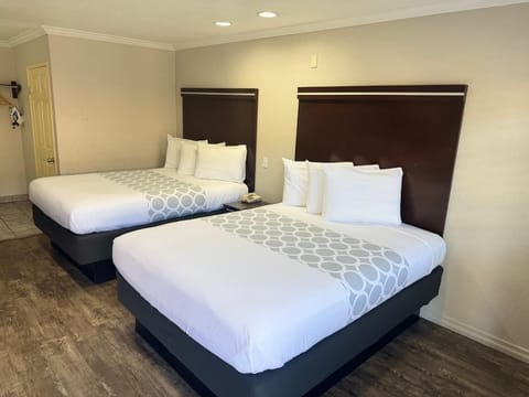 Standard Room, 2 Queen Beds, Non Smoking | Desk, laptop workspace, blackout drapes, iron/ironing board