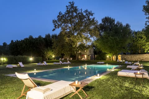 Seasonal outdoor pool, open 8:00 AM to 8:00 PM, pool umbrellas