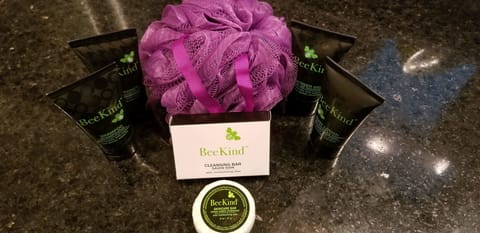 Designer toiletries, hair dryer, bathrobes, towels