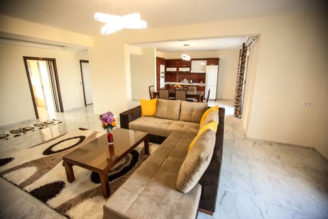 Apartment, 2 Bedrooms, Balcony | Living area | TV